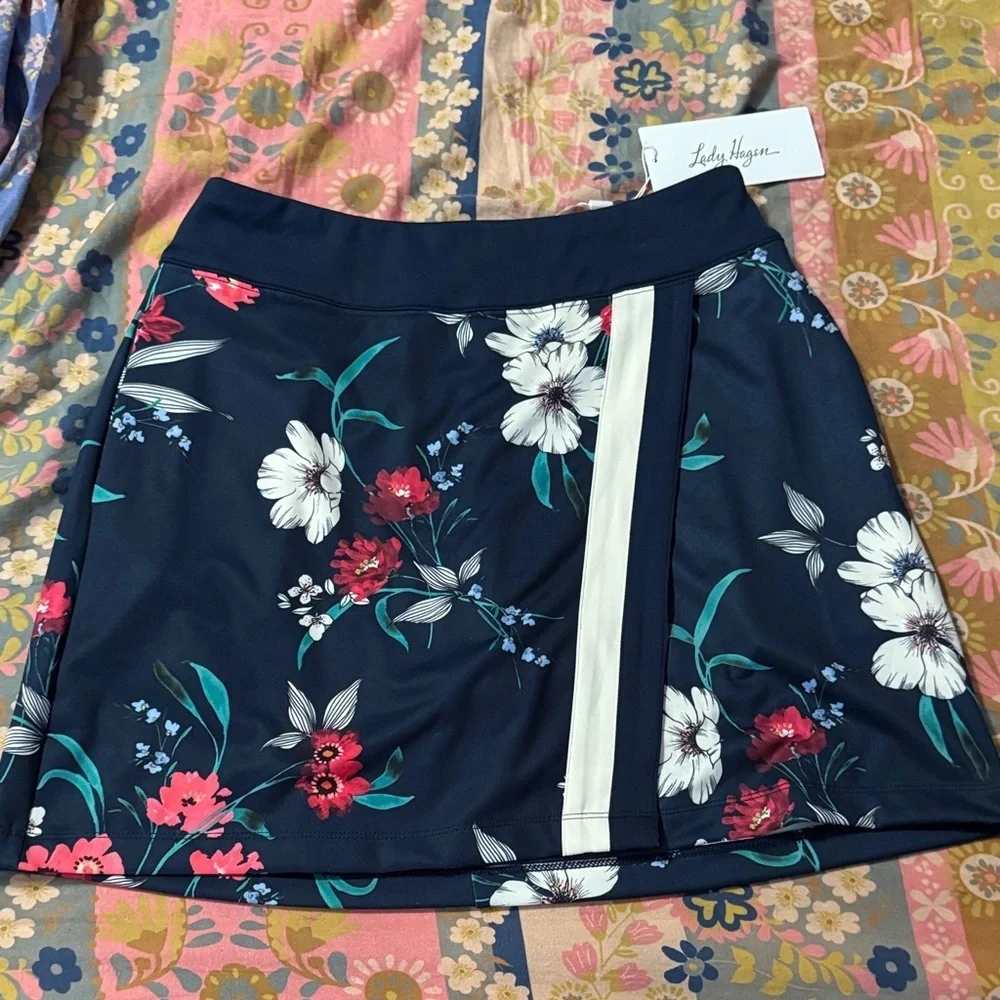 Lady Hagen Navy Floral Golf Skort with White Stripe Accent - Picture 1 of 6